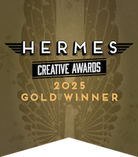 Hermes Creative Awards 2025 Gold Winner logo with gold wings, symbolizing top digital marketing, SEO services, and web development excellence.