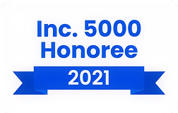 Blue and white badge reading "Inc. 5000 Honoree 2021" above ribbon, celebrating top digital marketing agency recognition.