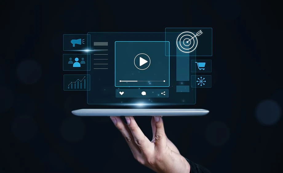 A hand holds a tablet with holographic icons of seo services, content marketing, social media marketing, paid media agency tools, and web development.