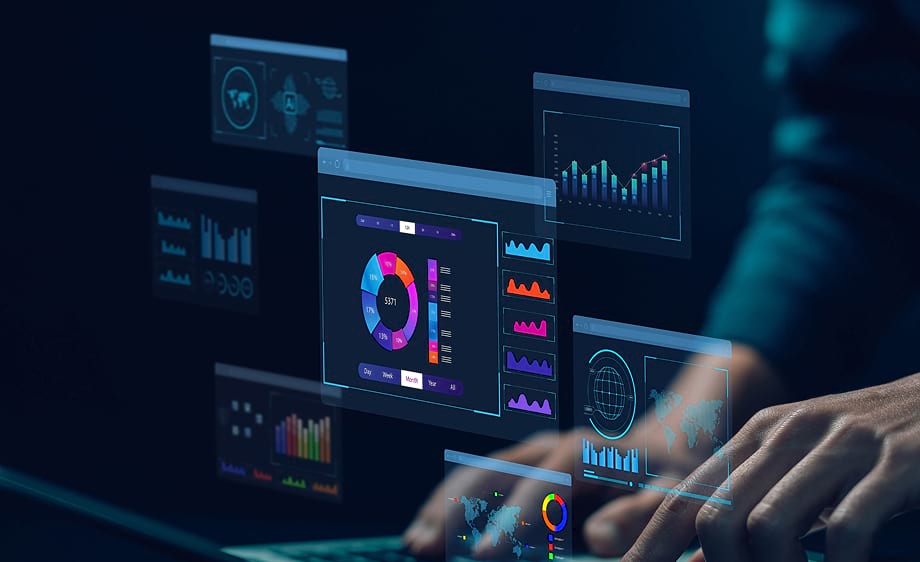Hands typing on laptop with digital marketing analytics, SEO, and social media data.