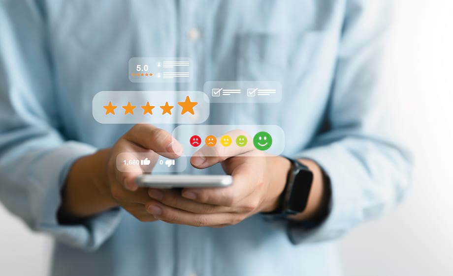 Digital marketing agency client reviews five-star SEO and social media services on phone.