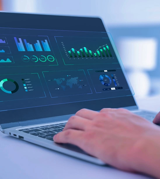 Digital marketing agency pro analyzing SEO, content, and social media dashboards on laptop.
