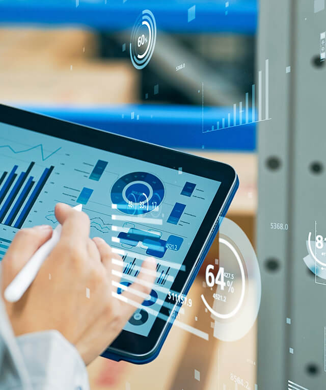 A marketer analyzes graphs on a tablet with digital overlays for SEO and content marketing insights.