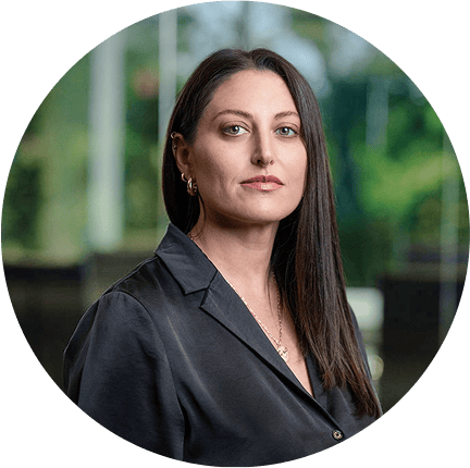 A stylish woman poses indoors, ideal for a digital marketing agency website.