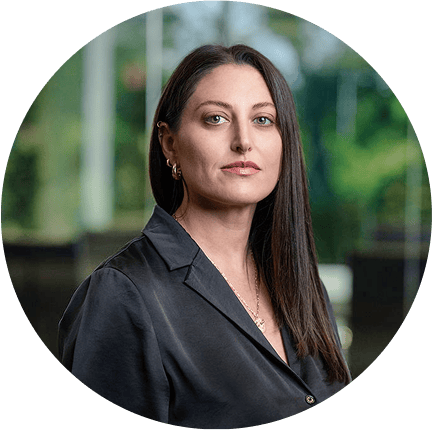 A stylish woman poses indoors, ideal for a digital marketing agency website.