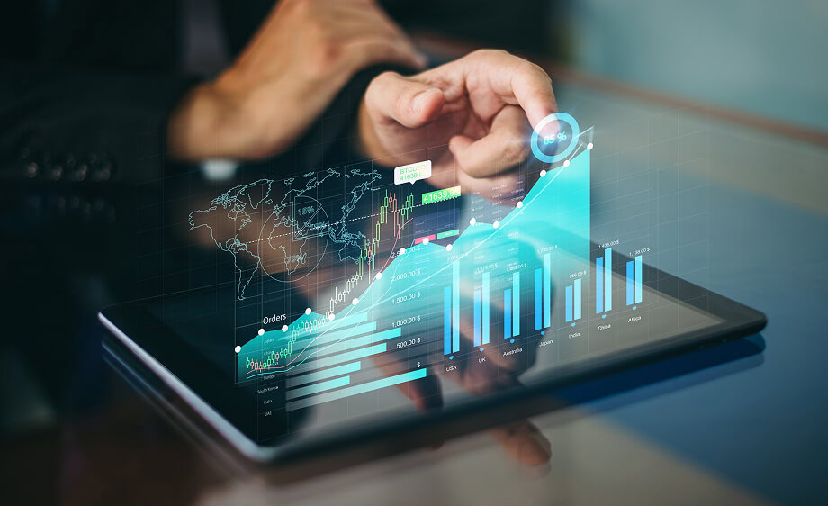 Person using tablet showing analytics charts for a digital marketing agency.