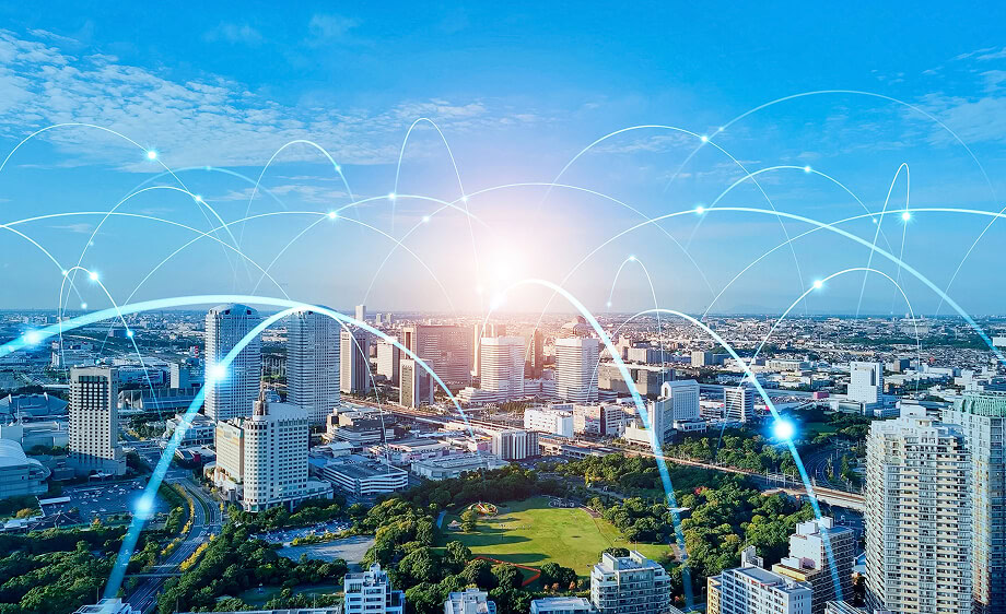 A city skyline with digital lines symbolizing SEO, web development, and paid media.