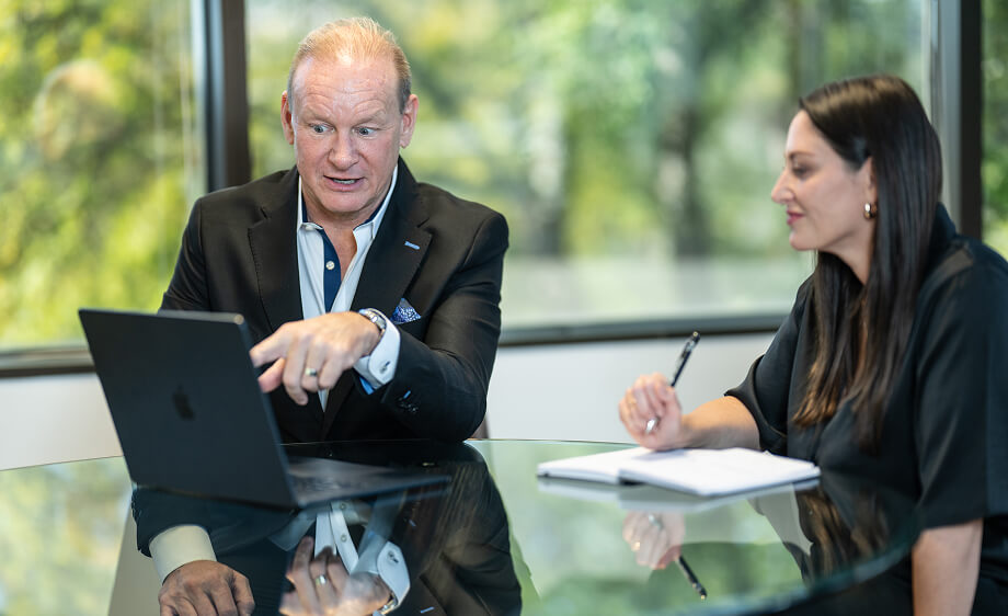 A digital marketing agency team reviews SEO services and content marketing plans.