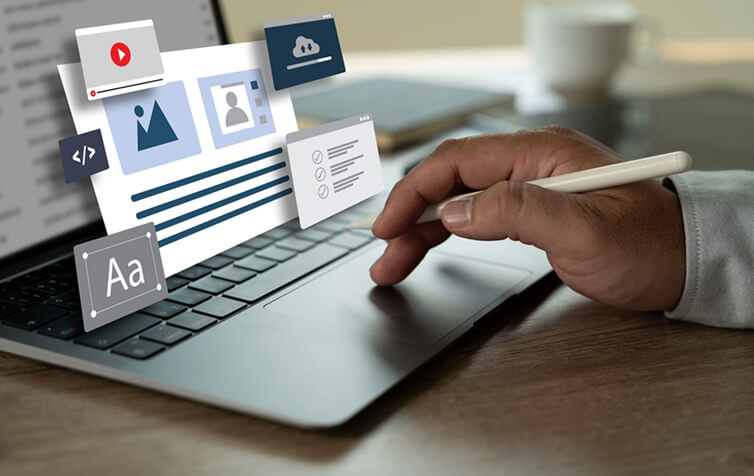 A person uses a laptop with stylus as SEO, content marketing, and social media icons float above the keyboard.