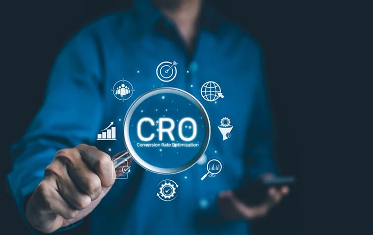 A person uses a magnifier on "CRO" amid SEO, content marketing, and web development icons.