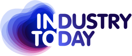Industry Today digital marketing agency logo featuring bold text on blue and purple shapes.