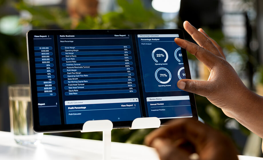 A marketer views SEO, content marketing, and social media metrics on a tablet dashboard.